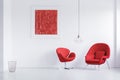 Modern red armchairs in room Royalty Free Stock Photo