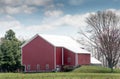 Modern red barn on working farm Royalty Free Stock Photo