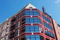 Modern red building against blue sky Royalty Free Stock Photo