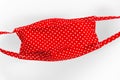 Modern red homemade mask used to protect against coronavirus Royalty Free Stock Photo