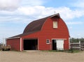 Modern red metal barn. Royalty Free Stock Photo