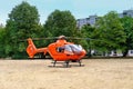 Modern Red paramedic ambulance emergency aircraft Germany on helipad, medical helicopter, Air medical services, Rapid Response