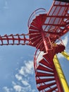 Modern Red Spiral Staircase Against Clear Blue Sky Royalty Free Stock Photo