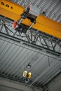 Modern remote control crane of a warehouse of a factory, inside Royalty Free Stock Photo