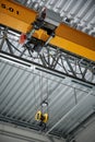 Modern remote control crane of a warehouse of a factory, inside Royalty Free Stock Photo