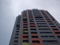 Modern residential building against the cloudy sky in summer Royalty Free Stock Photo