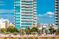 Modern residential buildings and pedestrian walkway along the seafront. Limassol, Cyprus