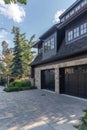 Modern Residential Home with Double Garage Doors in Suburbia Royalty Free Stock Photo