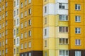 Modern residential multi-storey building. Windows and balconies on a new residential building close-up. Buying and selling Royalty Free Stock Photo