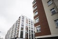 Modern residential multistory apartment buildings. Facade of new houses Royalty Free Stock Photo