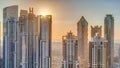 Modern residential and office complex with many towers aerial timelapse at sunset in Business Bay, Dubai, UAE. Royalty Free Stock Photo