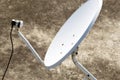 Modern residential satellite dish antenna cropped and partial view with selective focus under daylight. Royalty Free Stock Photo