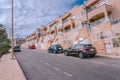 Modern residential street in Torrevieja with typical houses, vacation homes. Few cars parked. Spain Royalty Free Stock Photo