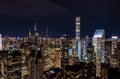 Modern residential towers in urban borough. Illuminated downtown skyscrapers at night. Manhattan, New York City, USA Royalty Free Stock Photo