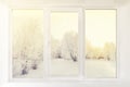 Modern residential window with snow and trees Royalty Free Stock Photo