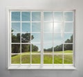 Modern residential window and trees and sky