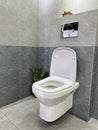 modern restroom with ceramic toilet bowl Royalty Free Stock Photo