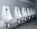 Modern restroom interior with urinal row Royalty Free Stock Photo