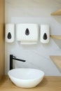 Modern restroom setup featuring a minimalist sink and soap dispenser in a clean, stylish environment, showcasing functionality and Royalty Free Stock Photo