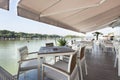 Modern riverside cafe terrace in the morning Royalty Free Stock Photo