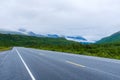 Modern road through Alaska wilderness Royalty Free Stock Photo