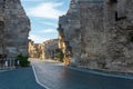 Road passes through the ancient Vespasian Gate in Side, Turkey Royalty Free Stock Photo