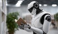 Modern robot with white and black parts reading a book indoors. Artificial intelligence training. Concept of learning by robot Royalty Free Stock Photo