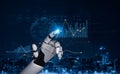 Modern Robotic Hand Touching Data Visualization Graphs with binary code and glowing fx in digital technology background Royalty Free Stock Photo