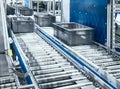 Modern roller conveyor system with boxes in motion Royalty Free Stock Photo