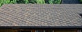 Modern roofing and decoration of chimneys. Flexible bitumen or slate shingles