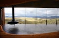 Modern room with a fireplace and view on mountain