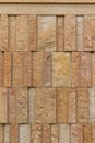 Modern rough textured limestone wall background with vertical aligned stone bricks Royalty Free Stock Photo