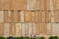 Modern rough textured limestone wall background with vertical aligned stone bricks Royalty Free Stock Photo