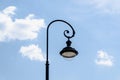 Modern round LED street lamp against clear blue sky. lamppost, lantern. Royalty Free Stock Photo