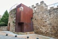 Modern rusty iron structure that houses the stairs to access the top of the medieval wall of Plasencia