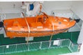 Modern safety lifeboat carried by a cruise ship Royalty Free Stock Photo