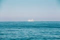 Modern Sail Ship at Sea Ocean On Horizon