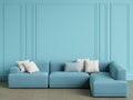 Modern Scandinavian Designlight blue sofa in interior.Blue walls with moldings,floor parquet herringbone Royalty Free Stock Photo