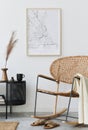 Modern Scandinavian Living Room Interior With Mock Up Poster Frame, Design Commode, Leaf In Vase, Rattanarmchair, Book.