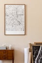 Brown mock up poster frame with map in stylish, Scandinavin living room interiior. Royalty Free Stock Photo