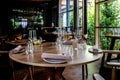 Modern scandinavian farmhouse contemporary rustic restaurant interior with wine glasses, selective focus