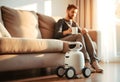 Man Relaxing with Robot Companion Royalty Free Stock Photo