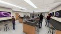 Modern scientific laboratory interior space with various people present inside it Royalty Free Stock Photo