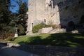 Modern sculpture against the background of an ancient building.