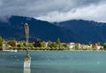 Modern sculpture - big fork in water of Geneva lake