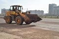 Russian SDLG Earthmover on Road Royalty Free Stock Photo