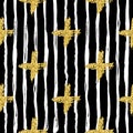 Modern seamless pattern with brush stripes and cross. White, gold metallic color on black background. Golden glitter Royalty Free Stock Photo