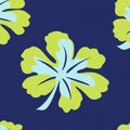 A modern seamless pattern featuring hibiscus flowers and tropical leaves Royalty Free Stock Photo