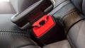 Seat belt on black leather seat
