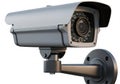 Modern security camera mounted on wall Royalty Free Stock Photo